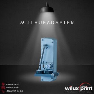 Mitlaufadapter MA der PAS42xx Etikettieranlage — Durchlauf-Applikator mit synchronem Abschwenken des Saugstempels für kontinuierliche Etikettierung